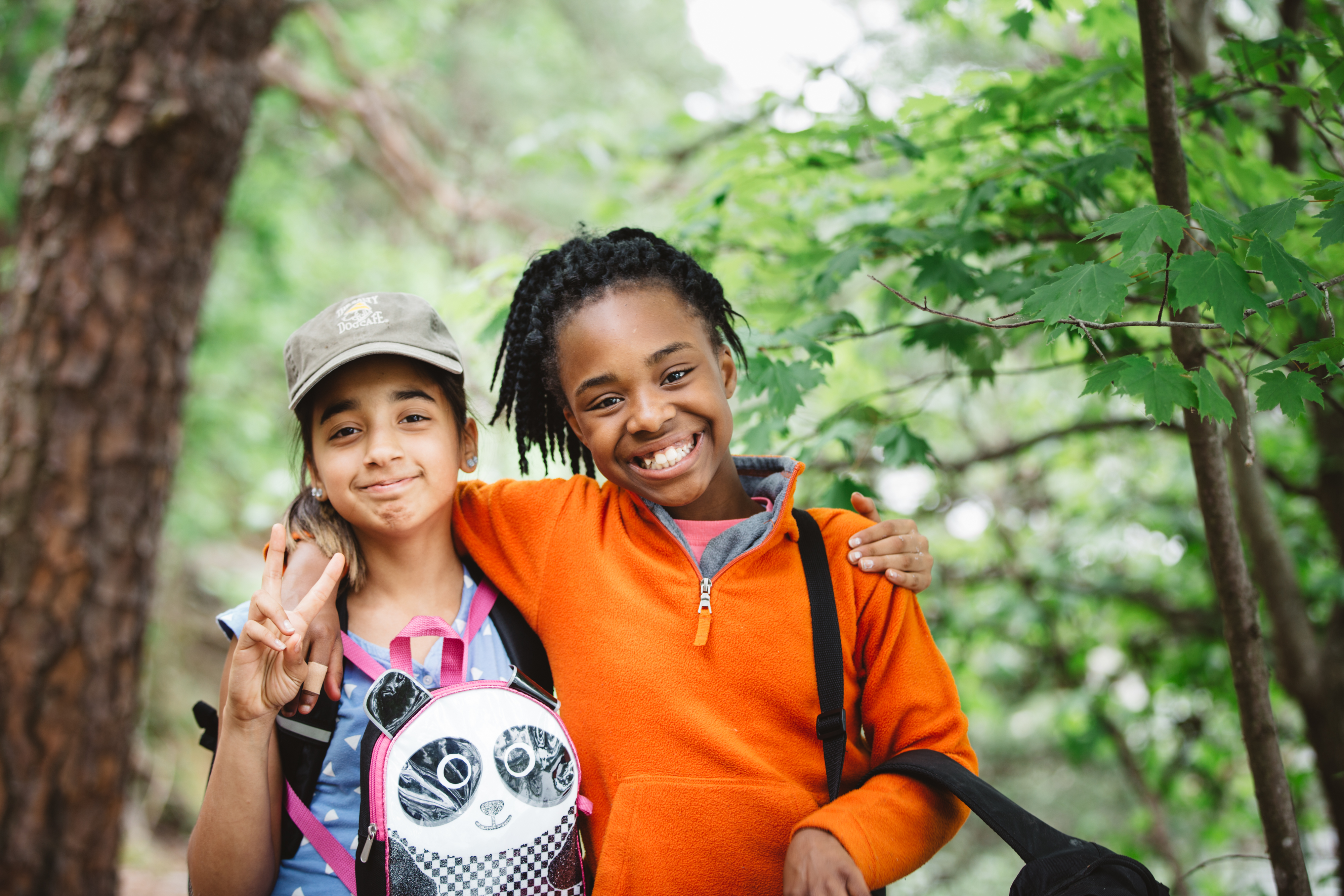 two young girls in the woods on a science program